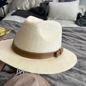 tan hat perfect for a casual look or vacation